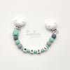 www.louloulaboutique.com attache doudou personnalisée avec un prénom perle silicone vert gris