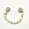 www.louloulaboutique.com attache doudou personnalisée avec un prénom perle silicone jaune bois